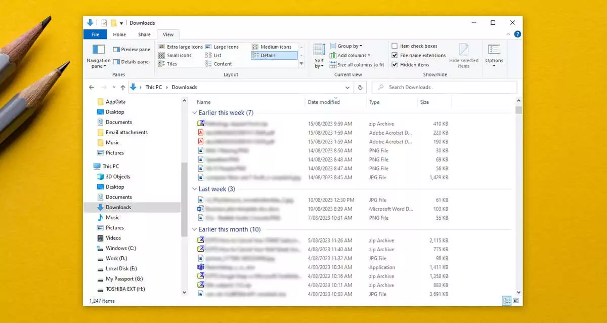 cách bật hoặc tắt-nhóm trong windows-file-explorer-1-nén - Help Desk Geek Cách bật hoặc tắt Off Nhóm trong Windows File Explorer hình ảnh 1