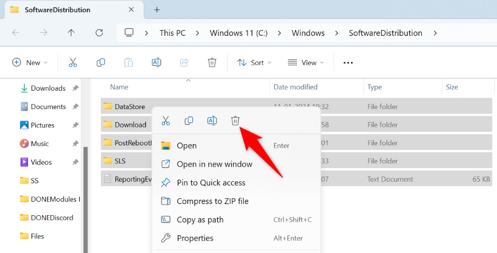 Cách giải quyết lỗi cài đặt Windows Update - 0x80070002 11 Biểu tượng thùng rác được tô sáng cho các tệp Windows Update đã chọn trong File Explorer.